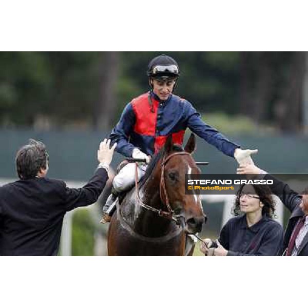 Matteo Limata and Riccardo Menichetti congratulate with Carlo Fiocchi returning home on United Color after winning the Premio Tudini. Roma - Capannelle racecourse, 20th may 2012 ph.Stefano Grasso