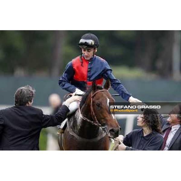 Matteo Limata and Riccardo Menichetti congratulate with Carlo Fiocchi returning home on United Color after winning the Premio Tudini. Roma - Capannelle racecourse, 20th may 2012 ph.Stefano Grasso