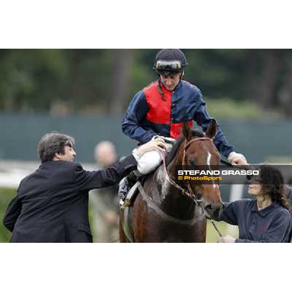 Matteo Limata congratulates with Carlo Fiocchi returning home on United Color after winning the Premio Tudini. Roma - Capannelle racecourse, 20th may 2012 ph.Stefano Grasso