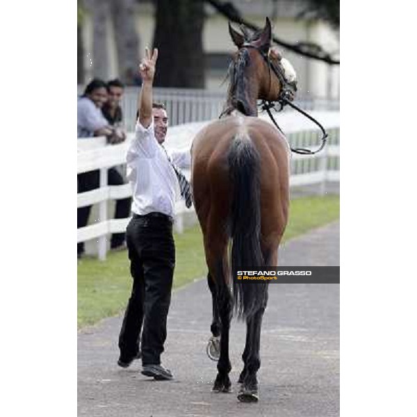 Jonathan Bacci exults returning home with Cherry Collect after winning the Oaks d\'Italia Milano - San Siro racecourse, 26th may 2012 ph.Stefano Grasso