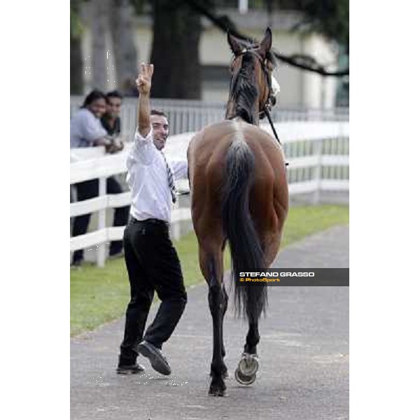 Jonathan Bacci exults returning home with Cherry Collect after winning the Oaks d\'Italia Milano - San Siro racecourse, 26th may 2012 ph.Stefano Grasso