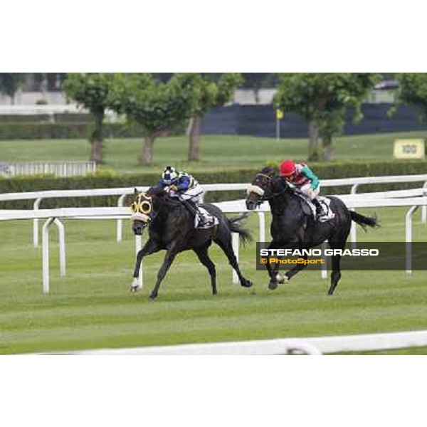 Cristian Demuro on Bit of Hell wins the Premio Giangiacomo Trivulzio beating Fabio Branca on Orpello Milano - San Siro galopp racecourse,10th june 2012 ph.Stefano Grasso