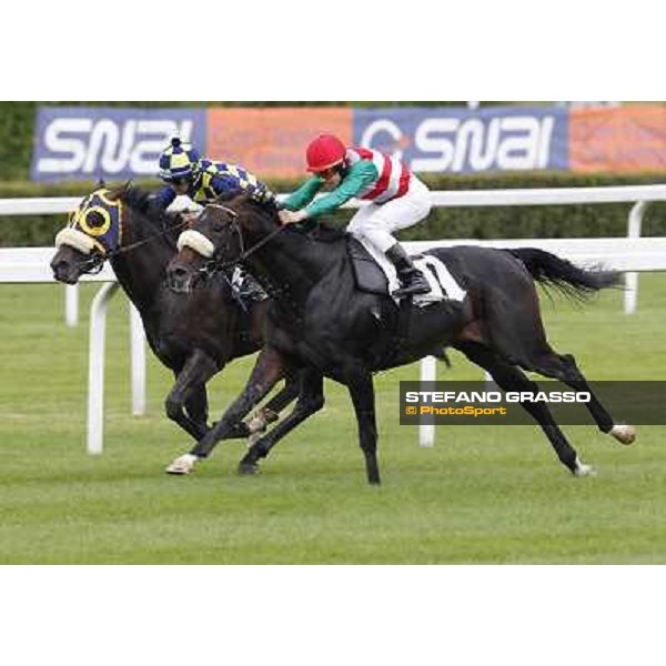 Cristian Demuro on Bit of Hell wins the Premio Giangiacomo Trivulzio beating Fabio Branca on Orpello Milano - San Siro galopp racecourse,10th june 2012 ph.Stefano Grasso