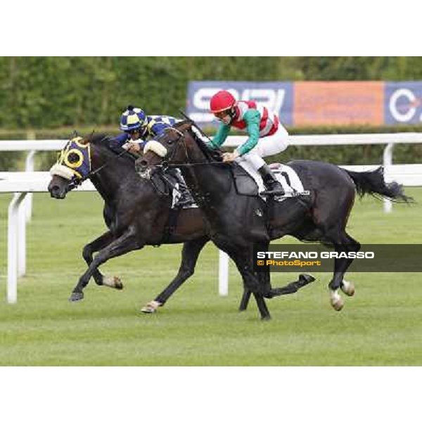 Cristian Demuro on Bit of Hell wins the Premio Giangiacomo Trivulzio beating Fabio Branca on Orpello Milano - San Siro galopp racecourse,10th june 2012 ph.Stefano Grasso