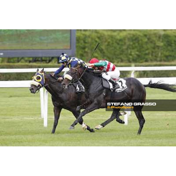 Cristian Demuro on Bit of Hell wins the Premio Giangiacomo Trivulzio beating Fabio Branca on Orpello Milano - San Siro galopp racecourse,10th june 2012 ph.Stefano Grasso