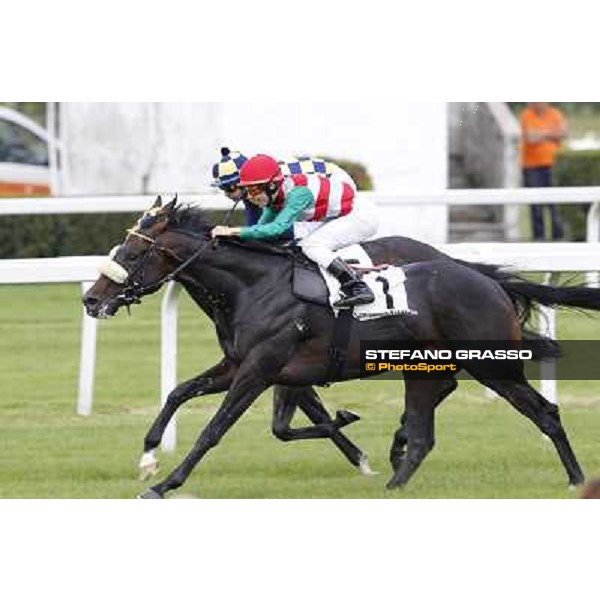 Cristian Demuro on Bit of Hell wins the Premio Giangiacomo Trivulzio beating Fabio Branca on Orpello Milano - San Siro galopp racecourse,10th june 2012 ph.Stefano Grasso