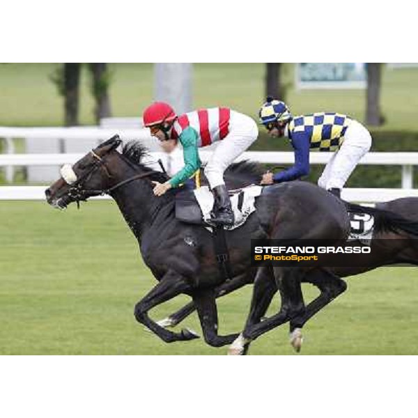 Cristian Demuro on Bit of Hell wins the Premio Giangiacomo Trivulzio beating Fabio Branca on Orpello Milano - San Siro galopp racecourse,10th june 2012 ph.Stefano Grasso