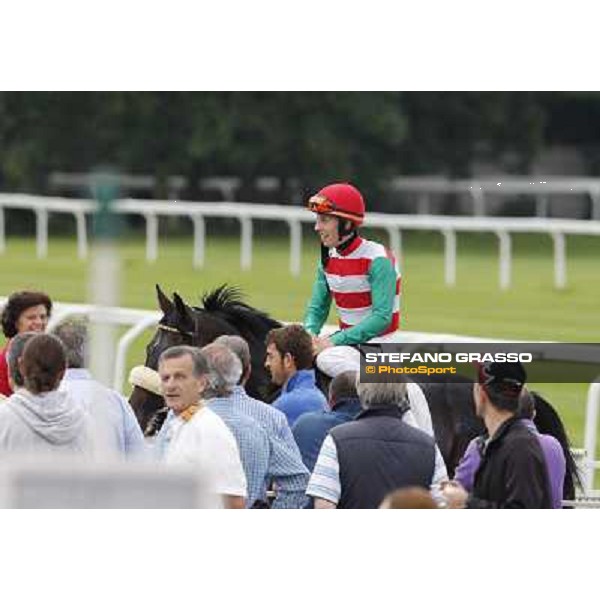 Cristian Demuro on Bit of Hell returns home after winning the Premio Giangiacomo Trivulzio Milano - San Siro galopp racecourse,10th june 2012 ph.Stefano Grasso