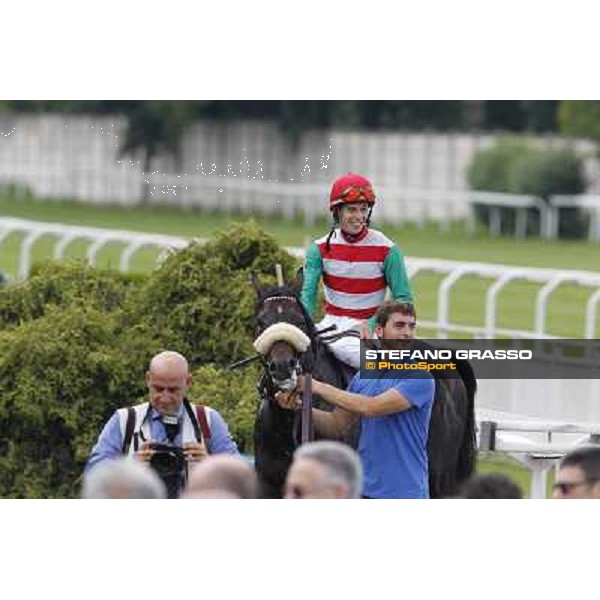 Cristian Demuro on Bit of Hell returns home after winning the Premio Giangiacomo Trivulzio Milano - San Siro galopp racecourse,10th june 2012 ph.Stefano Grasso