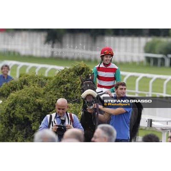 Cristian Demuro on Bit of Hell returns home after winning the Premio Giangiacomo Trivulzio Milano - San Siro galopp racecourse,10th june 2012 ph.Stefano Grasso