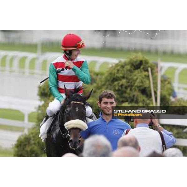 Cristian Demuro on Bit of Hell returns home after winning the Premio Giangiacomo Trivulzio Milano - San Siro galopp racecourse,10th june 2012 ph.Stefano Grasso