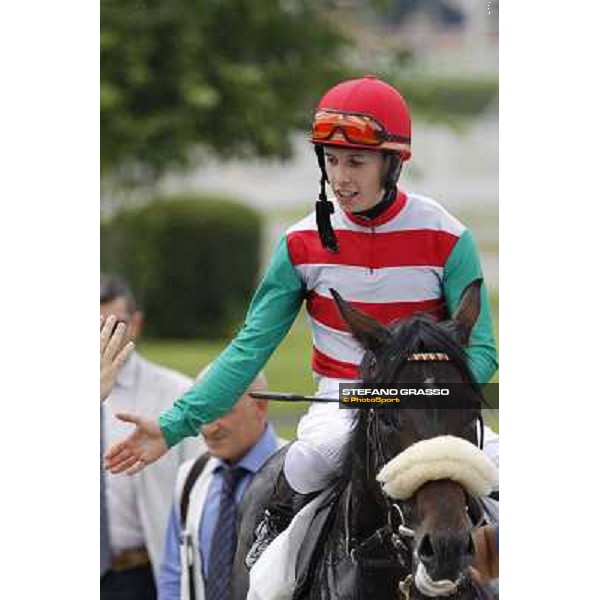 Cristian Demuro on Bit of Hell returns home after winning the Premio Giangiacomo Trivulzio Milano - San Siro galopp racecourse,10th june 2012 ph.Stefano Grasso