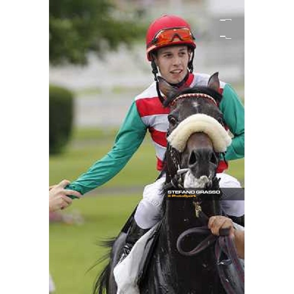 Cristian Demuro on Bit of Hell returns home after winning the Premio Giangiacomo Trivulzio Milano - San Siro galopp racecourse,10th june 2012 ph.Stefano Grasso