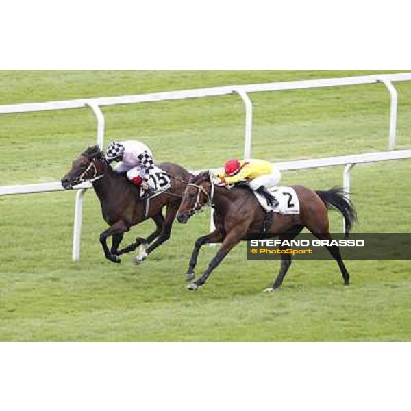 Mirco Demuro on Curioso goes to win the Premio Ettore Tagliabue beating Antonio Polli on Eccellente Idea Milano - San Siro galopp racecourse,10th june 2012 ph.Stefano Grasso