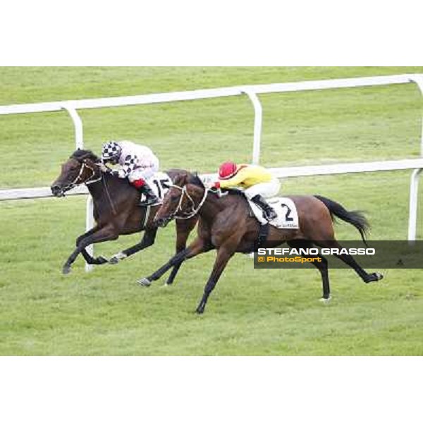 Mirco Demuro on Curioso goes to win the Premio Ettore Tagliabue beating Antonio Polli on Eccellente Idea Milano - San Siro galopp racecourse,10th june 2012 ph.Stefano Grasso