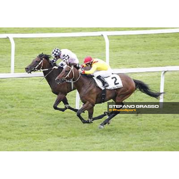 Mirco Demuro on Curioso goes to win the Premio Ettore Tagliabue beating Antonio Polli on Eccellente Idea Milano - San Siro galopp racecourse,10th june 2012 ph.Stefano Grasso