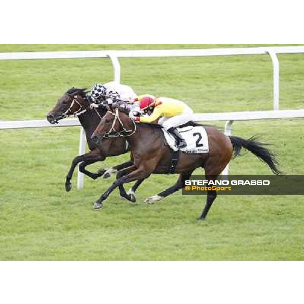 Mirco Demuro on Curioso goes to win the Premio Ettore Tagliabue beating Antonio Polli on Eccellente Idea Milano - San Siro galopp racecourse,10th june 2012 ph.Stefano Grasso