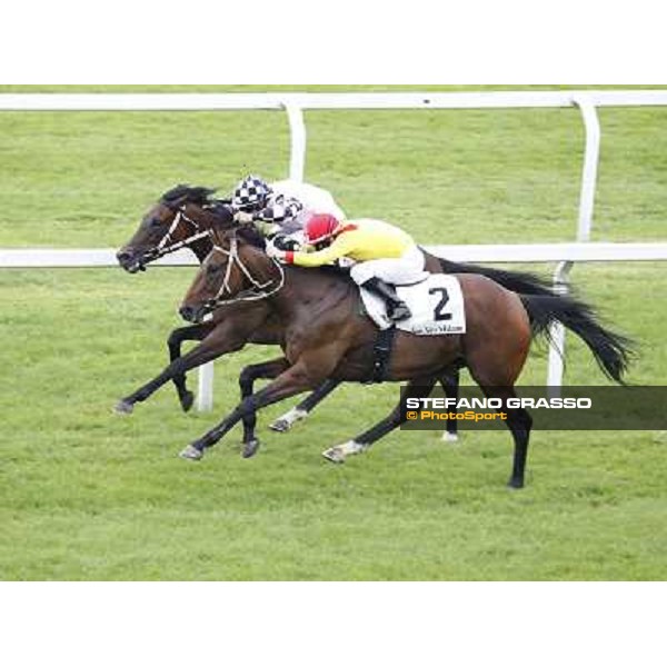 Mirco Demuro on Curioso goes to win the Premio Ettore Tagliabue beating Antonio Polli on Eccellente Idea Milano - San Siro galopp racecourse,10th june 2012 ph.Stefano Grasso