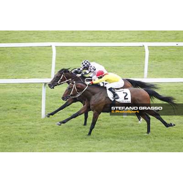 Mirco Demuro on Curioso goes to win the Premio Ettore Tagliabue beating Antonio Polli on Eccellente Idea Milano - San Siro galopp racecourse,10th june 2012 ph.Stefano Grasso