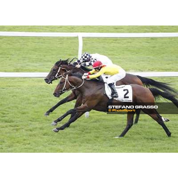 Mirco Demuro on Curioso goes to win the Premio Ettore Tagliabue beating Antonio Polli on Eccellente Idea Milano - San Siro galopp racecourse,10th june 2012 ph.Stefano Grasso