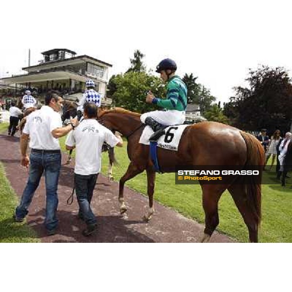 Dario Vargiu on Choisir Shadow enters the winner circle of Premio Bersaglio Milano - San Siro galopp racecourse,10th june 2012 ph.Stefano Grasso