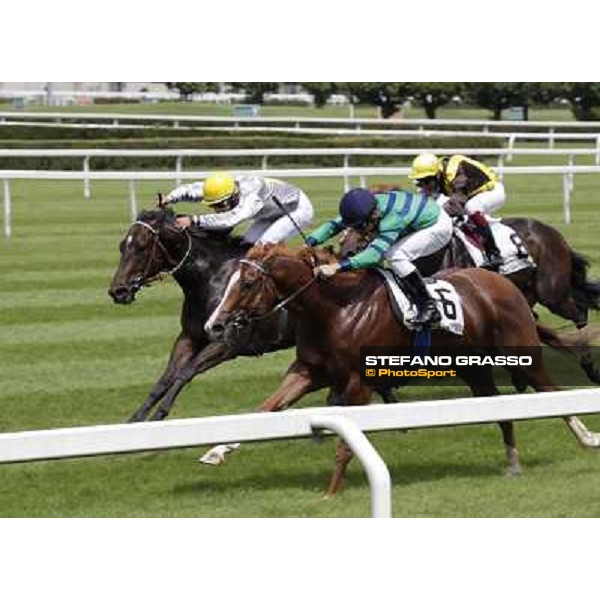 Dario Vargiu on Choisir Shadow goes to win the Premio Bersaglio beating Fabio Branca on Pandar Milano - San Siro galopp racecourse,10th june 2012 ph.Stefano Grasso