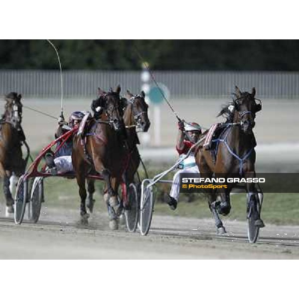 Pietro Gubellini and Pleasure Kronos enter the final straight of the Gran Premio Nazionale Filly Milano - San Siro trot racecourse, 30th june 2012 ph.Stefano Grasso