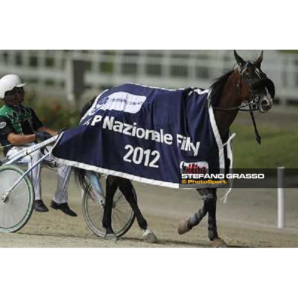 Enrico Bellei and Petra Inn Ronco after winning the Gran Premio Nazionale Filly Milano - San Siro trot racecourse, 30th june 2012 ph.Stefano Grasso