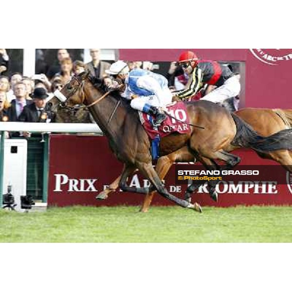 Olivier Peslier on Solemia wins the Qatar Prix de L\'Arc de Triomphe beating Christophe Soumillon on Orfevre Paris - Longchamp racecourse 7th oct..2012 ph.Stefano Grasso