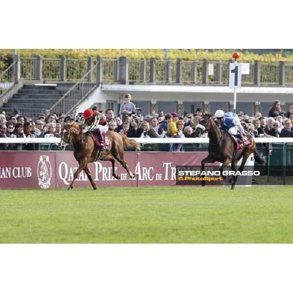 Olivier Peslier on Solemia wins the Qatar Prix de L\'Arc de Triomphe beating Christophe Soumillon on Orfevre Paris - Longchamp racecourse 7th oct..2012 ph.Stefano Grasso