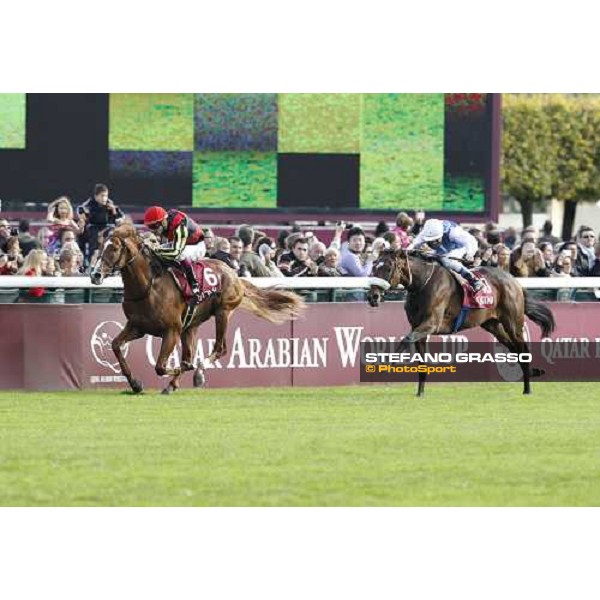 Olivier Peslier on Solemia wins the Qatar Prix de L\'Arc de Triomphe beating Christophe Soumillon on Orfevre Paris - Longchamp racecourse 7th oct..2012 ph.Stefano Grasso