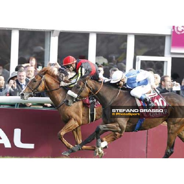 Olivier Peslier on Solemia wins the Qatar Prix de L\'Arc de Triomphe beating Christophe Soumillon on Orfevre Paris - Longchamp racecourse 7th oct..2012 ph.Stefano Grasso