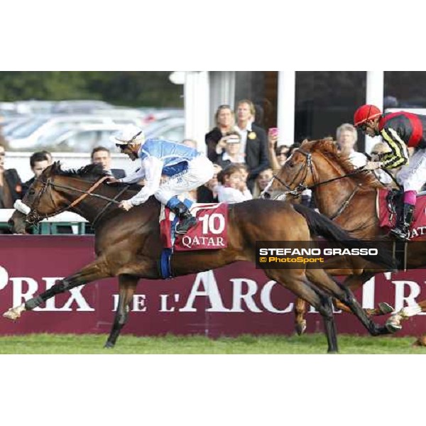 Olivier Peslier on Solemia wins the Qatar Prix de L\'Arc de Triomphe beating Christophe Soumillon on Orfevre Paris - Longchamp racecourse 7th oct..2012 ph.Stefano Grasso