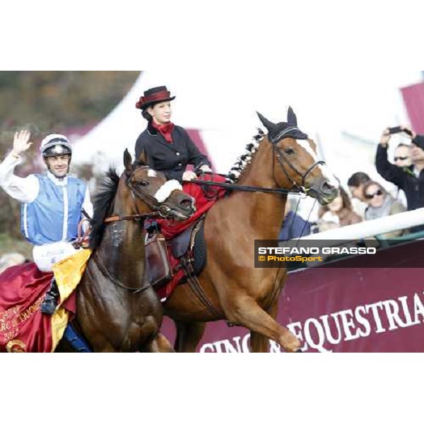 Olivier Peslier on Solemia wins the Qatar Prix de L\'Arc de Triomphe beating Christophe Soumillon on Orfevre Paris - Longchamp racecourse 7th oct..2012 ph.Stefano Grasso