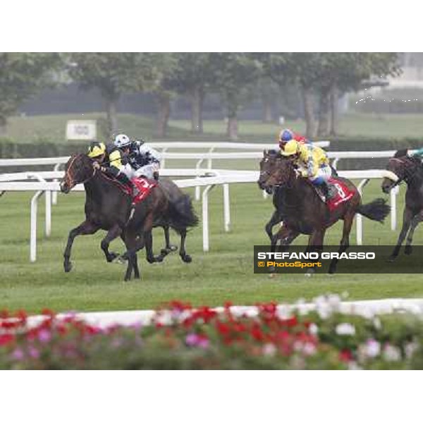 Stephane Pasquier on Law Enforcement goes to win the Premio Gran Criterium- 2nd Sorella Bella,3rd Pearl Flute Milano - San Siro racecourse, 13th oct.2012 ph.Stefano Grasso