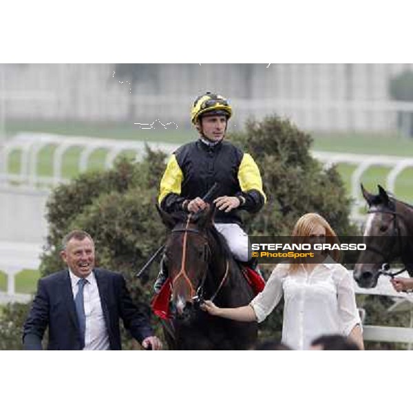 Stephane Pasquier on Law Enforcement and his connection return home after winning the Premio Gran Criterium - Milano - San Siro racecourse, 13th oct.2012 ph.Stefano Grasso