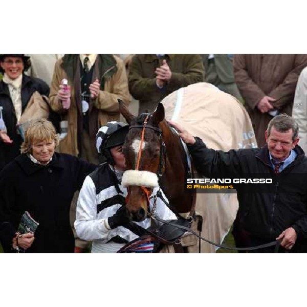 Barry Geraghty kiss Moscow Flyer in the winner enclosure of the Queen Mother Champion Steeple Chase. At his left the trainer Mrs. J.Harrington Cheltenham - The Festival 2nd day 16 march 2005 ph. Stefano Grasso