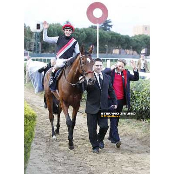 Andrea Atzeni on Sortilege celebrates with the owner after winning the Gran Premio Longines Lydia Tesio Rome, Capannelle racecourse 28th october 2012 ph.Stefano Grasso