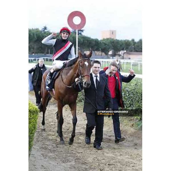Andrea Atzeni on Sortilege celebrates with the owner after winning the Gran Premio Longines Lydia Tesio Rome, Capannelle racecourse 28th october 2012 ph.Stefano Grasso