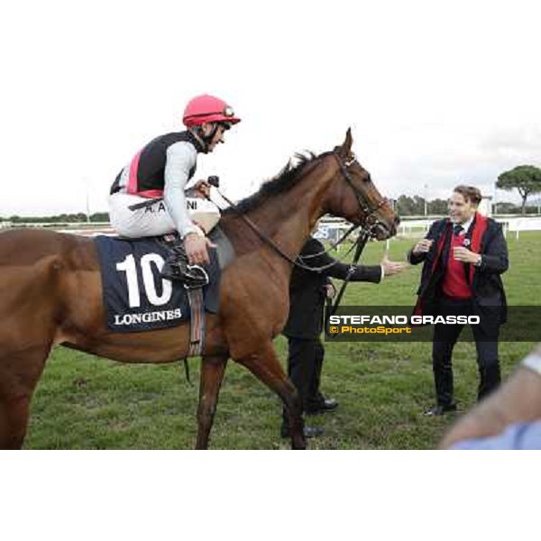 Andrea Atzeni on Sortilege celebrates with the owner after winning the Gran Premio Longines Lydia Tesio Rome, Capannelle racecourse 28th october 2012 ph.Stefano Grasso
