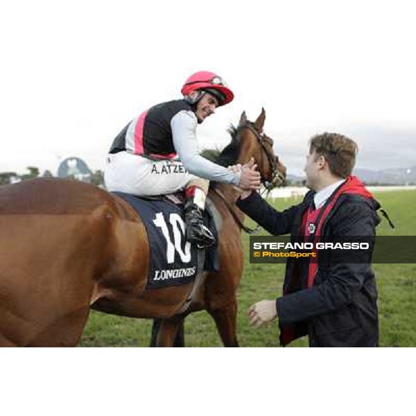 Andrea Atzeni on Sortilege celebrates with the owner after winning the Gran Premio Longines Lydia Tesio Rome, Capannelle racecourse 28th october 2012 ph.Stefano Grasso