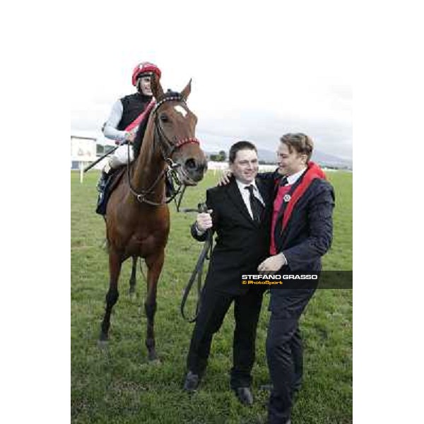 Andrea Atzeni on Sortilege celebrates with the owner after winning the Gran Premio Longines Lydia Tesio Rome, Capannelle racecourse 28th october 2012 ph.Stefano Grasso