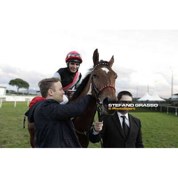 Andrea Atzeni on Sortilege celebrates with the owner after winning the Gran Premio Longines Lydia Tesio Rome, Capannelle racecourse 28th october 2012 ph.Stefano Grasso