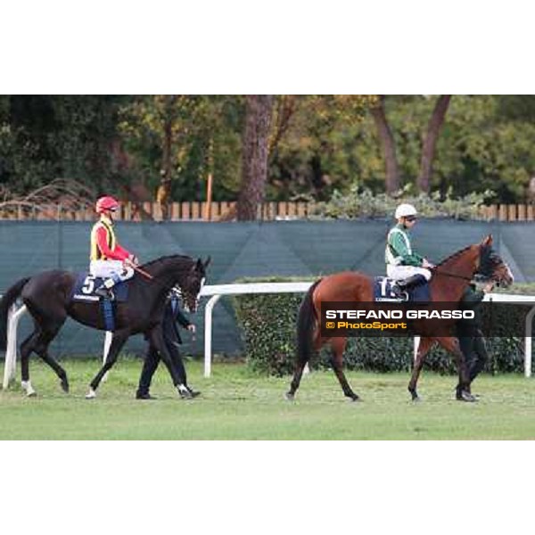 Mickael Barzalona on Wedding Fair and Olivier Peslier on Nova Hawk go to the start of the Premio Longines Lydia Tesio Roma - Capannelle racecourse,28th oct.2012 ph.Stefano Grasso