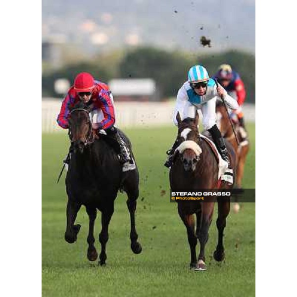 Cristian Demuro on Girl of the Rain wins the Premio Ubaldo Pandolfi beating Fabio Branca on Grand Treasure Roma - Capannelle racecourse,28th oct.2012 ph.Stefano Grasso