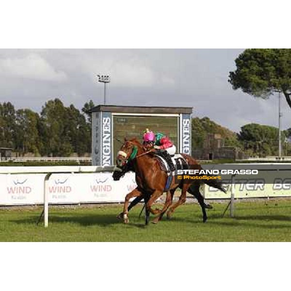 Pierantonio Convertino on Benvenue wins the Premio Conte Felice Scheibler beating Romantic Wave Roma - Capannelle racecourse,28th oct.2012 ph.Stefano Grasso
