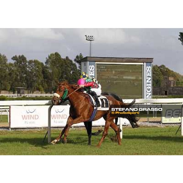 Pierantonio Convertino on Benvenue wins the Premio Conte Felice Scheibler beating Romantic Wave Roma - Capannelle racecourse,28th oct.2012 ph.Stefano Grasso