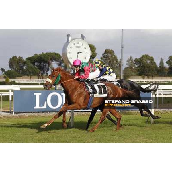 Pierantonio Convertino on Benvenue wins the Premio Conte Felice Scheibler beating Romantic Wave Roma - Capannelle racecourse,28th oct.2012 ph.Stefano Grasso