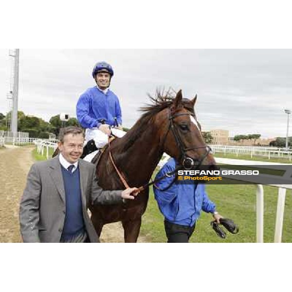 Silvestre De Sousa on Hunter\'s Light and Tommy Burns return home after winning the Gran Premio Roma GBI Racing Rome- Capannelle racecourse,4th nov.2012 ph.Stefano Grasso