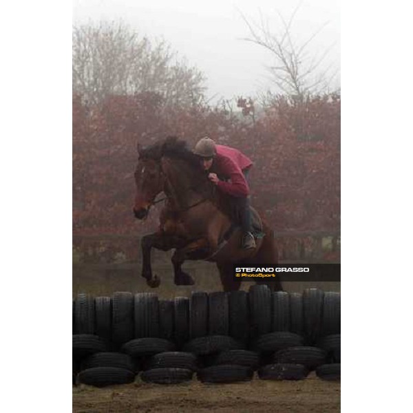Dr. Philip Pritchard with Happy Hussar on training at Timber Pond Racing stables Purton, Gloucestershire 19th march 2005 Ph. Stefano Grasso